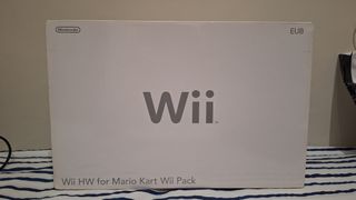 Consola Nintendo Wii + juegos + Caja y mando