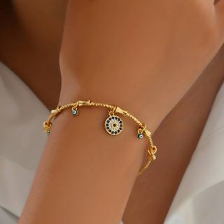 Pulsera Ojos Protectores Acero y Oro 18K