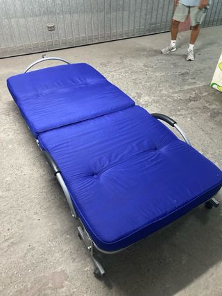 Cama plegable.