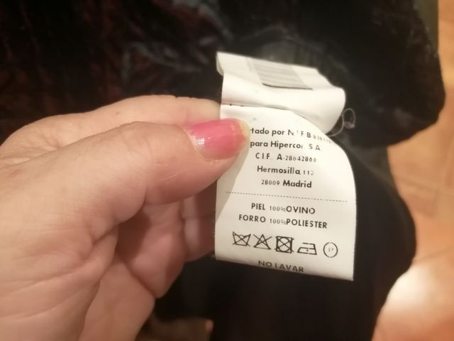 Chaqueta de cuero negra con cinturón