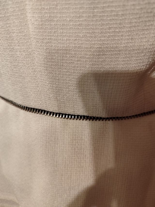 Chaqueta  blanca talla cómo una S es una L muy peq