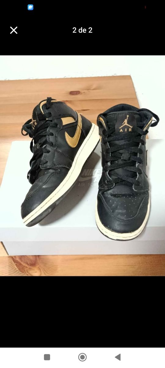Air Jordan 1 Negro y Dorado