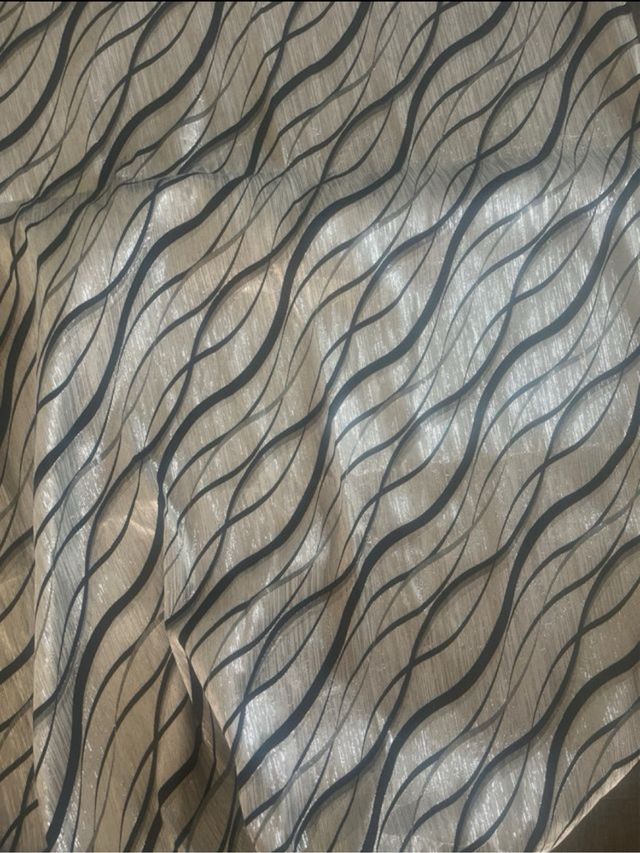 Tessuto nero e argento con onde