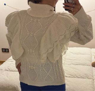 Jersey cuello alto con volantes