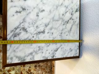 Mesa de centro de mármol y madera