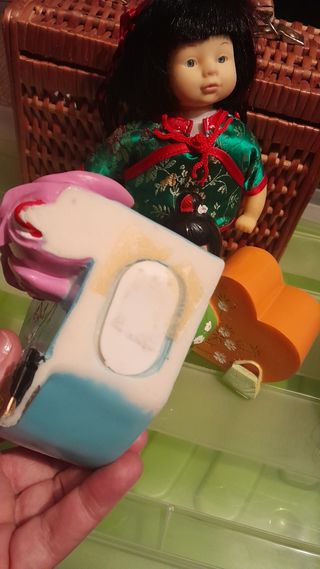 Bambole asiatiche e bambola di pezza