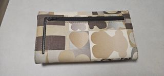 Monedero Tous Beige y Marrón.
Original.
Poco uso