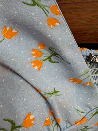 Vestido Zara azul flores naranjas