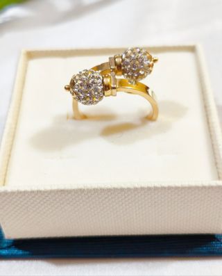 Anillo de diseño cruzado de oro amarillo 18K/750