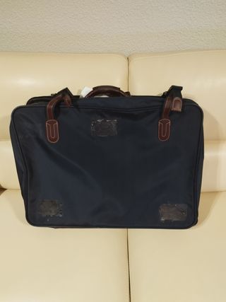 Maleta de viaje azul y multicolor