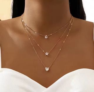 Colgante multicapa con dijes de circonita