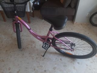 Bicicleta paseo mujer rosa con muy poco uso.