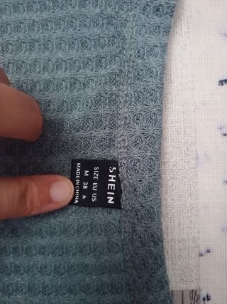 Jersey corto color verde azulado