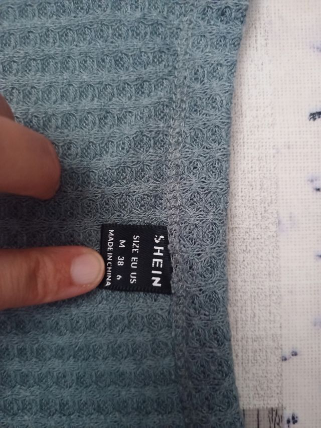 Jersey corto color verde azulado