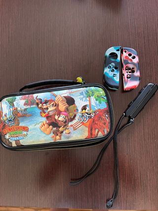 Nintendo Switch Funda y 2 juegos con microfono