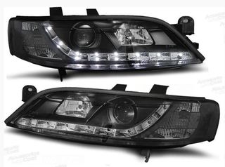 FAROS LUZ DIURNA LED OPEL VECTRA B. FONDO NEGRO.
