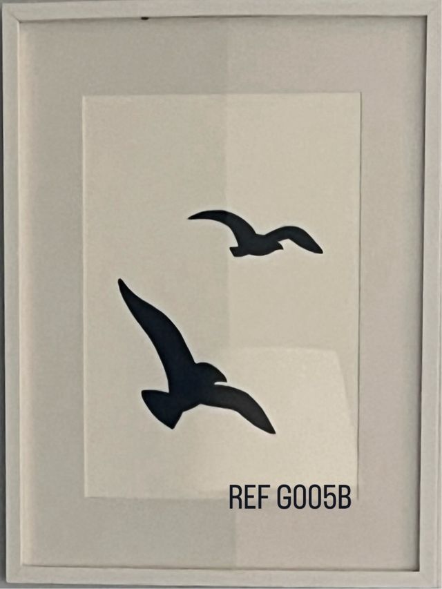 Quadro in carta bianca nera con gabbiani minimalisti