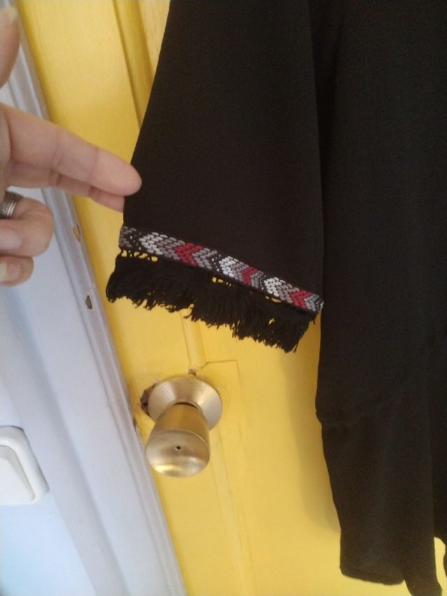 Blusón negro con cordón