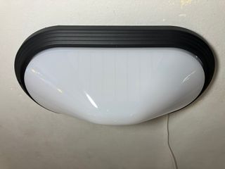 Lampada parete plastica nero IP65