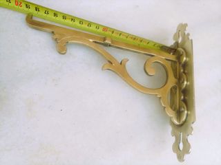 Percha gancho colgador de latón.