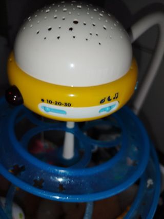 Móvil proyector para cuna