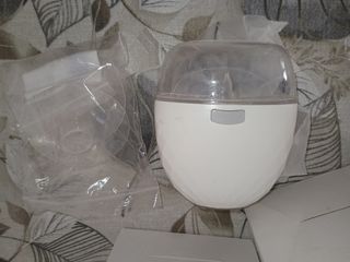 Tiralatte con buste conserva latte