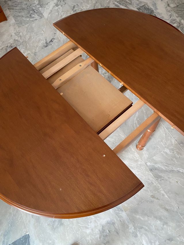 Mesa redonda extensible de madera y cristal