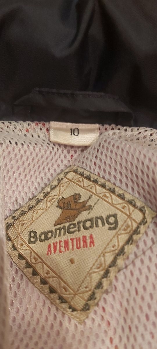 Chubasquero niña talla 10. Marca boomerang
