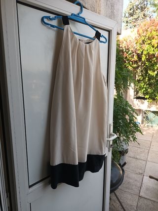 Camisa sin mangas beige y negra