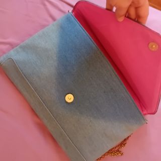 Cartera de mano vaquera bordada