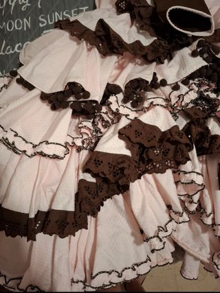 Traje de flamenca rosa y marrón