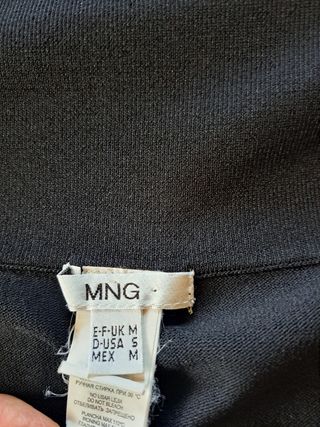Top de punto negro sin hombros