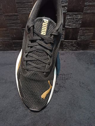 Puma Pounce Lite Negro/Dorado
Protread
