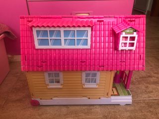 Casa Barriguitas portátil con muñecas