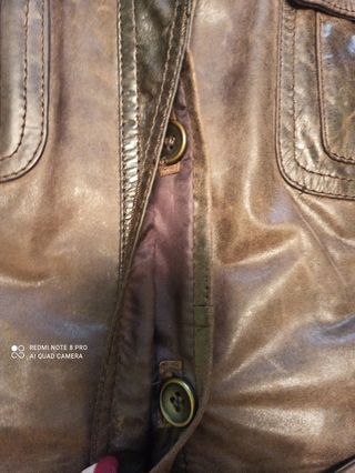 Cazadora biker de cuero marrón Zara. 
