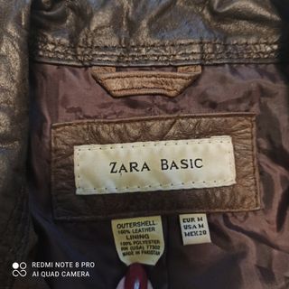 Cazadora biker de cuero marrón Zara. 