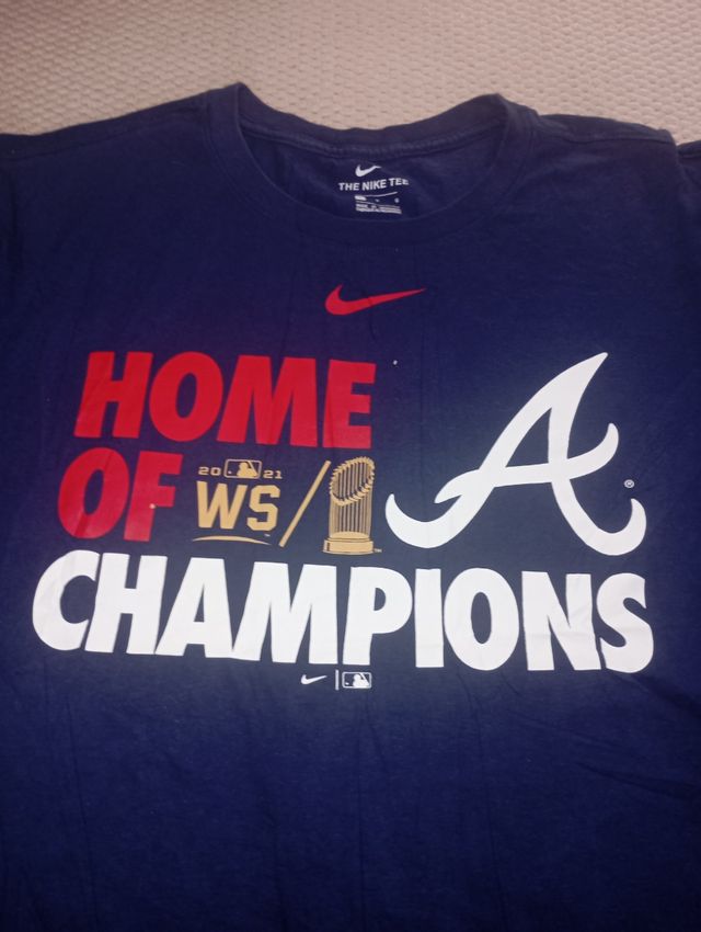 Camiseta Nike Home of Champions L