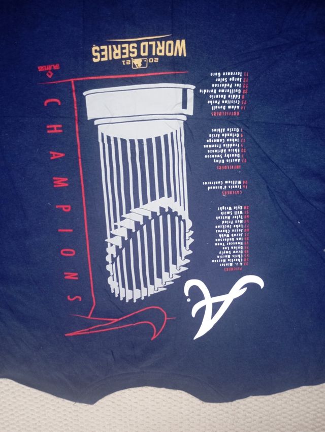 Camiseta Nike Home of Champions L