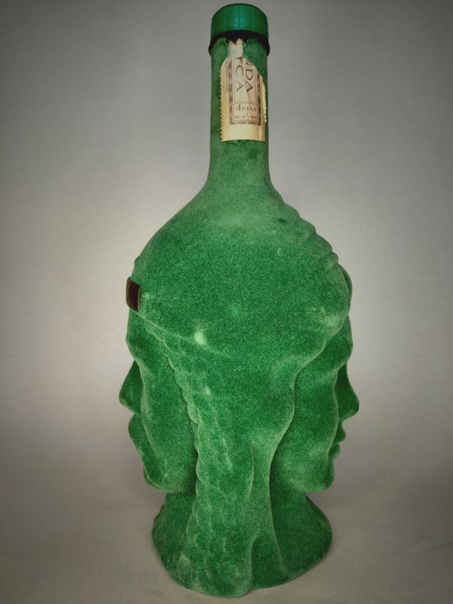 Botella Crema de Pipermint terciopelo verde caras