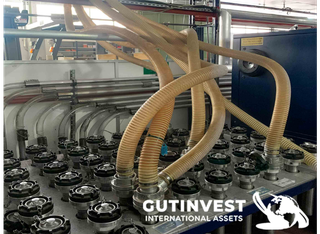 Instalación alimentación material inyectoras