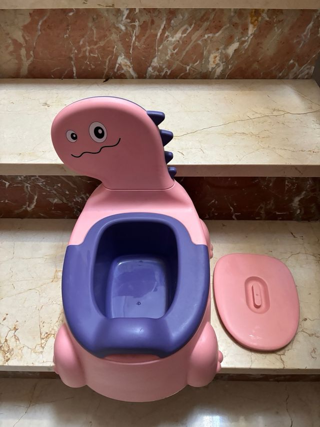 Orinal infantil dinosaurio rosa