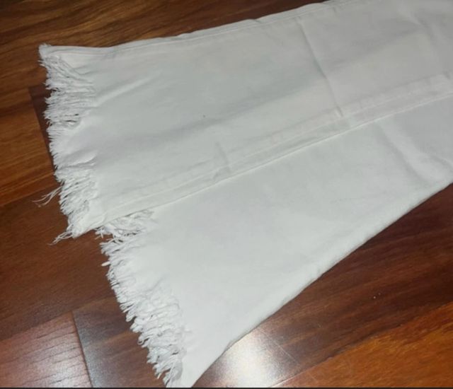 Pantalón campana blanco tiro medio