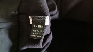 Falda pantalón negra y camiseta talla L