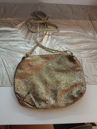 Bolso de fiesta dorado con purpurina