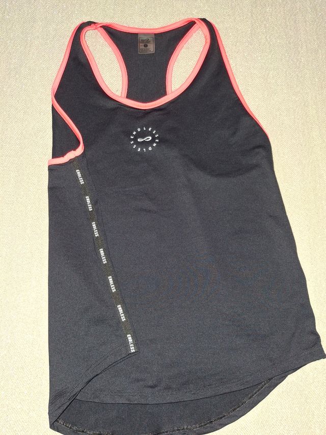 Camiseta Padel Mujer Endless Negra y ribete fucsia