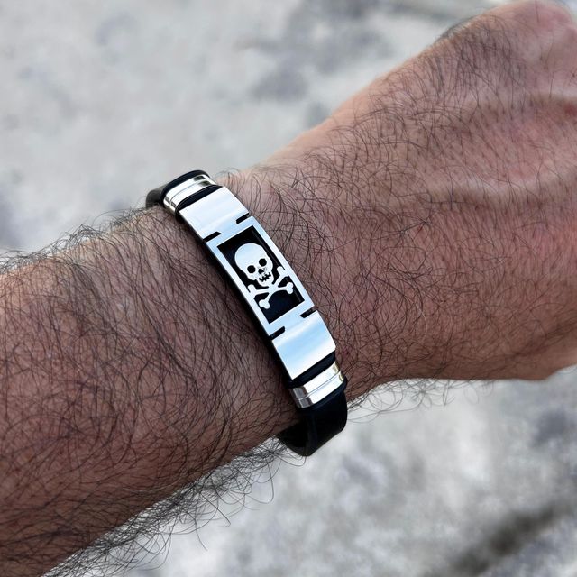 Pulsera calavera cuero negro y acero ajustable