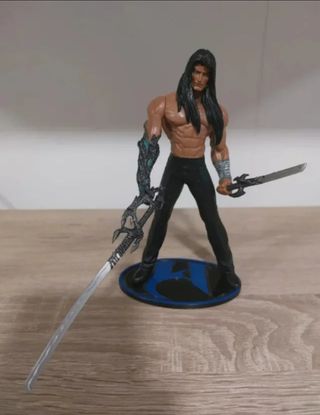 Figura de acción Nottingham con espadas