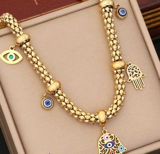 Collar Bañado en Oro con Ojo Turco y Mano de Fátim