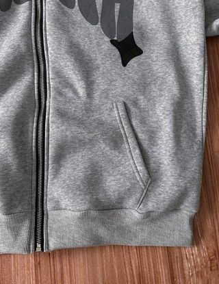 Sudadera con cremallera gris