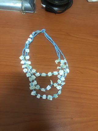 Colgante de cuentas y conchas